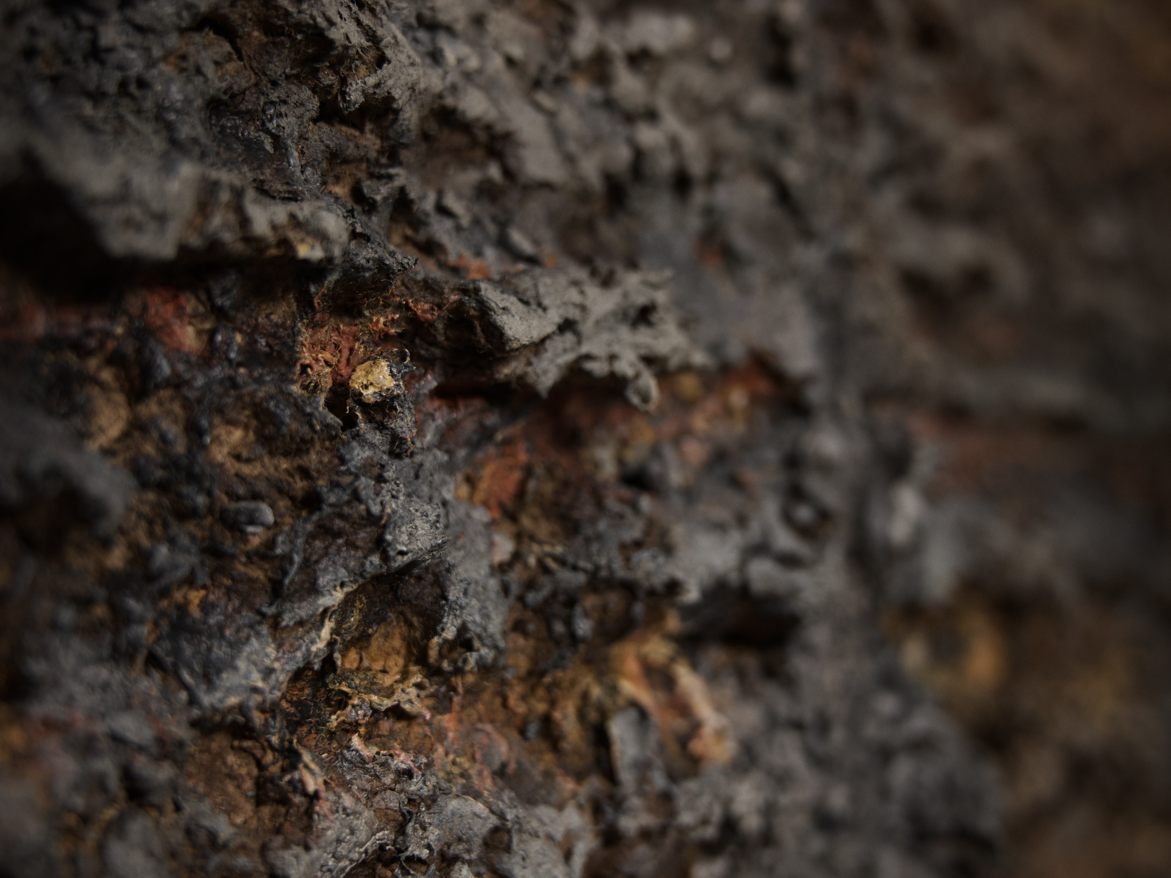 Textured sculptural block with raw organic form, embodying the dialogue between material and space—an artistic narrative in texture